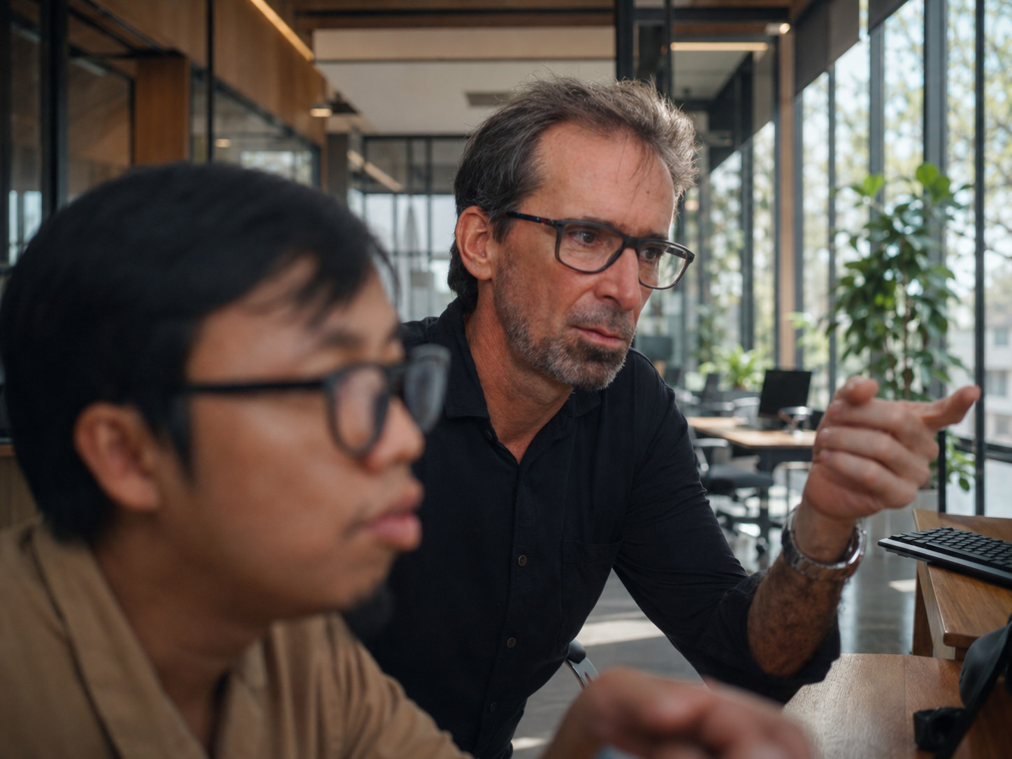 Doodex senior consultant reviewing Odoo work with a team member